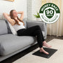 Woman Relaxing on Sofa with a Grounding Mat